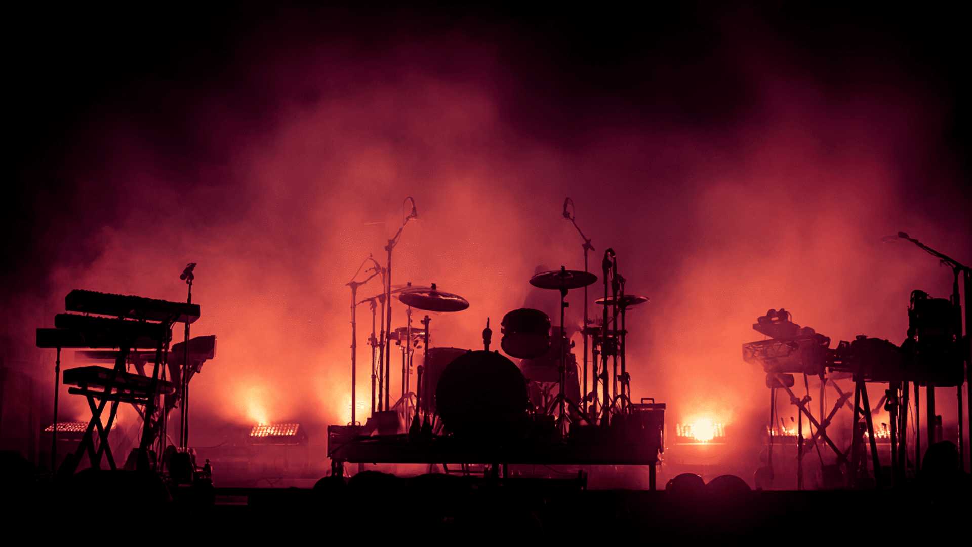 a dramatic stage setup of rock band
